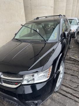 Sell My Scrap Car | Black Dodge Journey for Junk Car Removal and Recycling