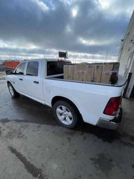 Sell My Scrap Car | White Pickup Truck Loaded with Boxes for Recycling
