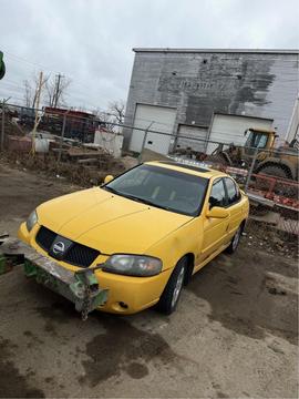 Sell My Scrap Car | Yellow Nissan Sentra Ready for Junk Car Removal