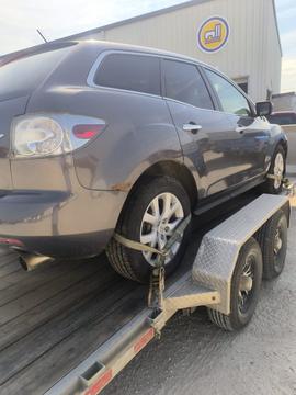 Sell My Scrap Car | Mazda CX-7 on Trailer for Junk Car Removal